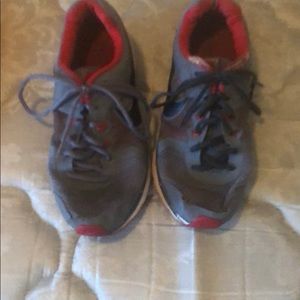 Red and grey Nike shoes